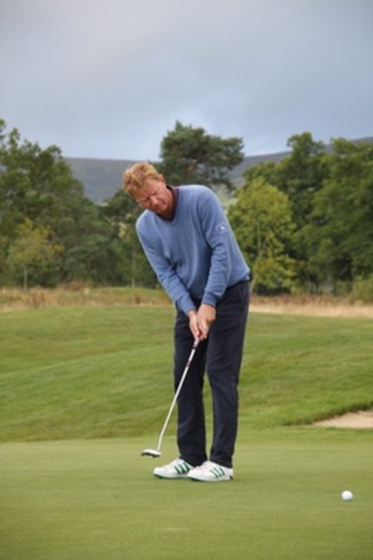 Hans Schokkenbroek aan het putten, Royal Dornoch, Schotland